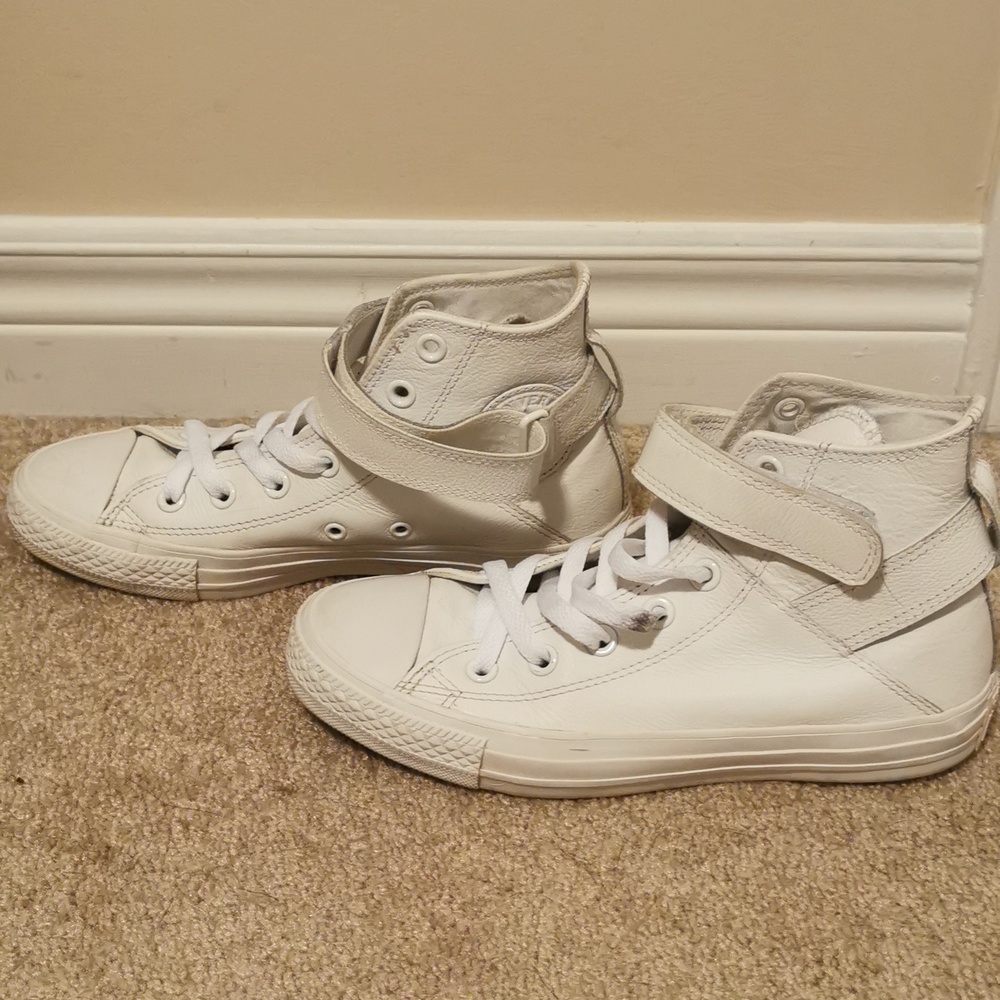 White leather high top Converse sneakers